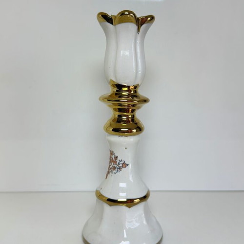 Ceramic candlestick with gold details and floral cross design