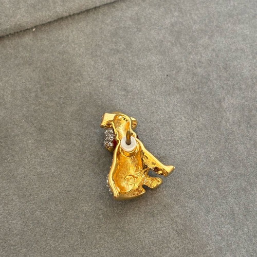 Swarovski dog brooch used with emeralds