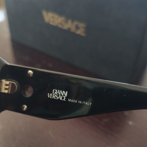 Versace collectible sunglasses, black lenses and frame