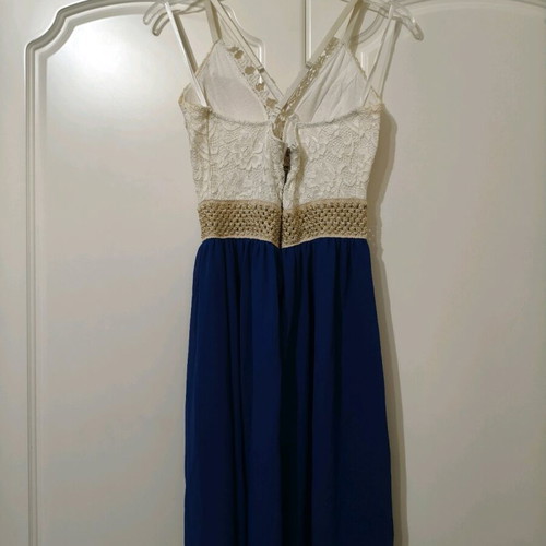 Sleeveless dress like new with white lace bust and blue skirt