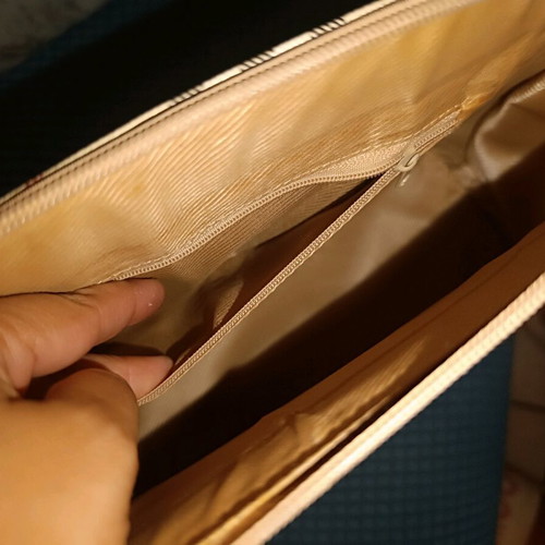 Handheld bag checkered in very good condition