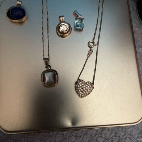 Faux Bijoux like new, pack of 10 silver necklace pendants