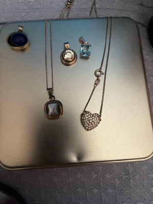 Faux Bijoux like new, pack of 10 silver necklace pendants