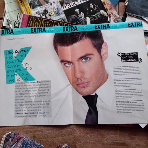 Kostas Martakis tribute with interview and giant poster