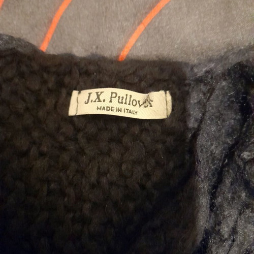Black women's knitted top with fringes used