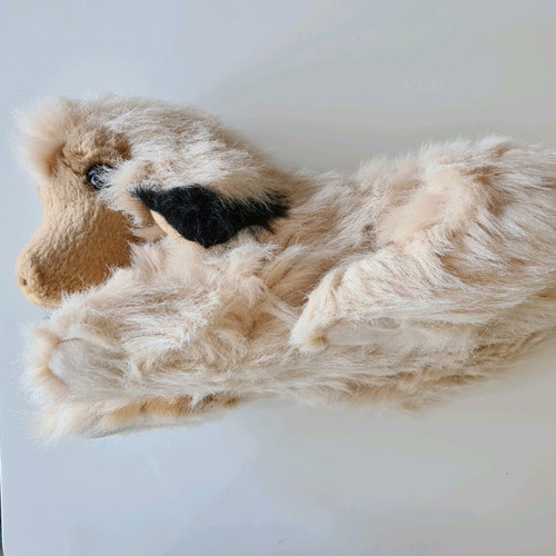 Stuffed dog used in good condition with missing nose