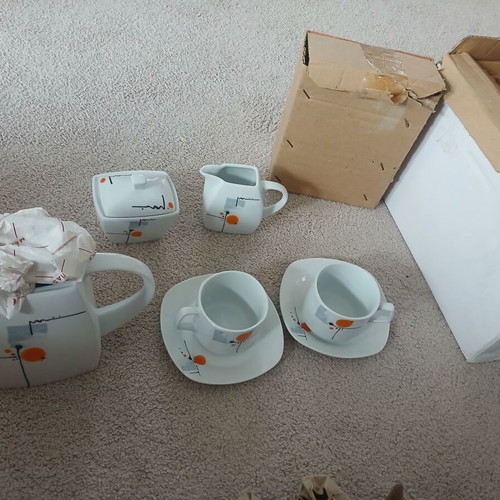 Tea set new with teapot, containers and 6 cups
