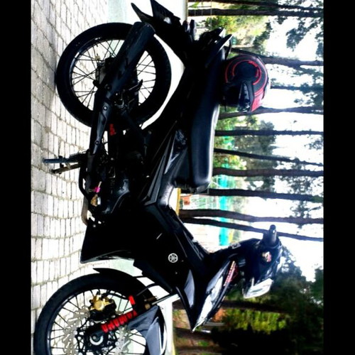 Complete motorcycle wheels with tires, disc and drum brakes
