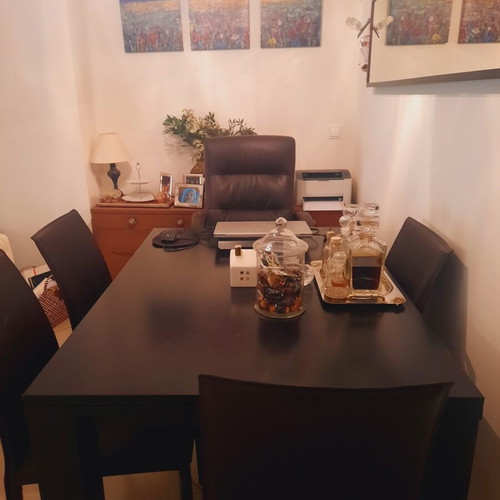 Bo Concept extendable dining table with 4 leather chairs used