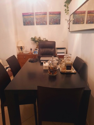 Bo Concept extendable dining table with 4 leather chairs used