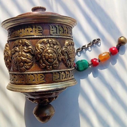 Tibetan prayer wheel used with original thin old paper