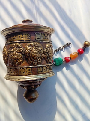 Tibetan prayer wheel used with original thin old paper