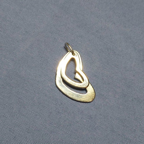 Jewelry used, metal heart Folli Follie, not silver