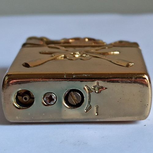 Vintage metal windproof lighter with skull and crossed rifles
