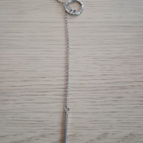 Lariat necklace with thin chain and circular motif used