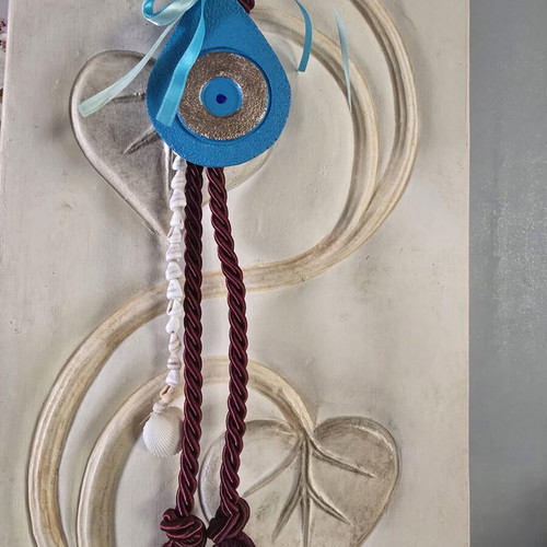Handmade eye charm from porcelain with a summer touch