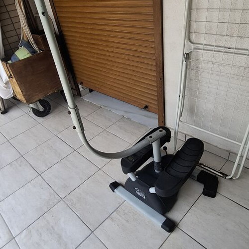 Step elliptical fitness machine used with small step counter screen