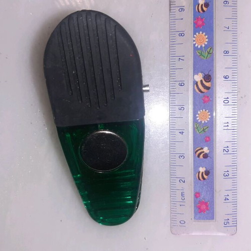 Magnet used for organizing papers on fridge