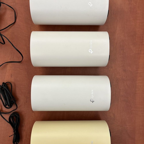 TP-Link Deco M4 mesh WiFi system, 4 units, one sun-faded