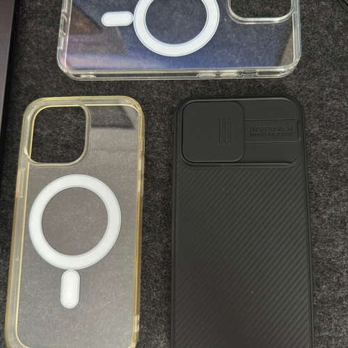 iPhone 14 Pro Max cases used, pack of 3, including Nilkin and OEM MagSafe