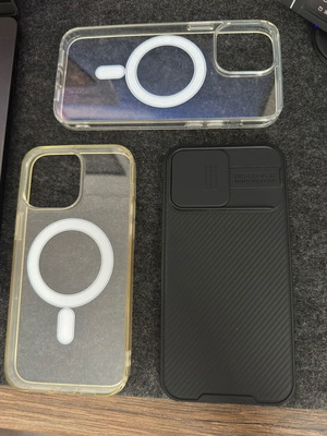 iPhone 14 Pro Max cases used, pack of 3, including Nilkin and OEM MagSafe