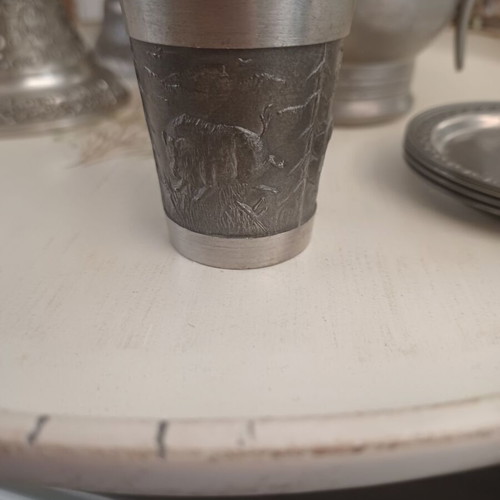 Pewter shot glass used with beautiful designs