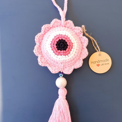 Handmade crochet evil eye in baby pink