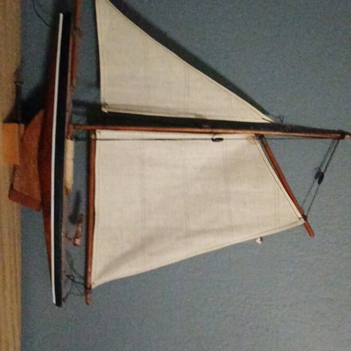 Decorative wooden ship and large handcrafted wooden boat