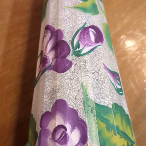 Hand-painted bottle used with embossed patterns