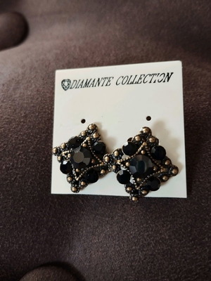 Vintage clip earrings with black stones and bronze-colored metal new