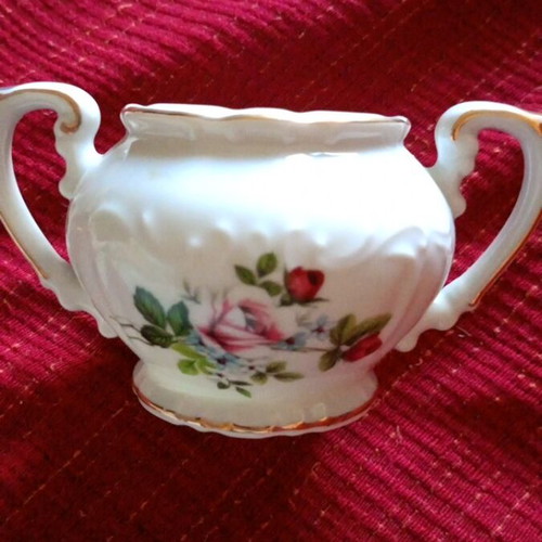 Porcelain sugar bowl with floral vintage design