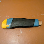 Utility knife used with rusted blade