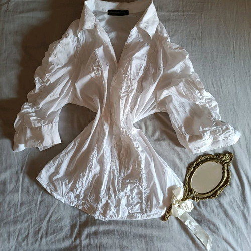 White vintage shirt size S like new with puffed sleeves and patterns
