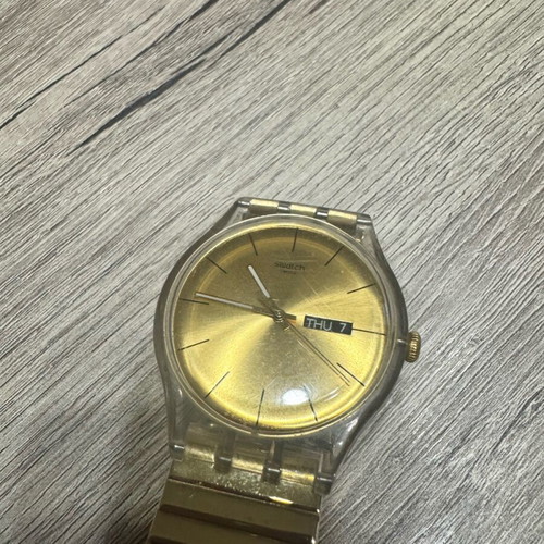 Swatch Dazzling Light χρυσαφί μπρασελέ από ανοξείδωτο ατσάλι μεταχειρισμένο σε καλή κατάσταση