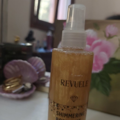 Revuele Shimmering Body Mist 200ml like new, Blooming Garden scent