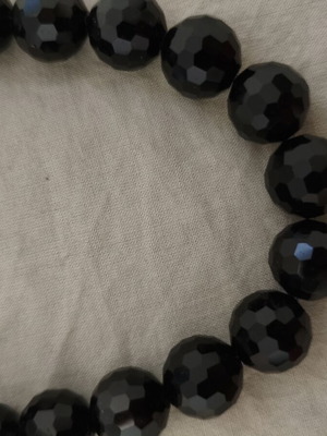 Handmade necklace with black faceted beads and blue iridescence, new