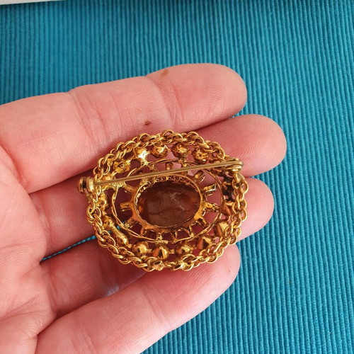 Vintage brooch used, gold color with crystals and cabochon