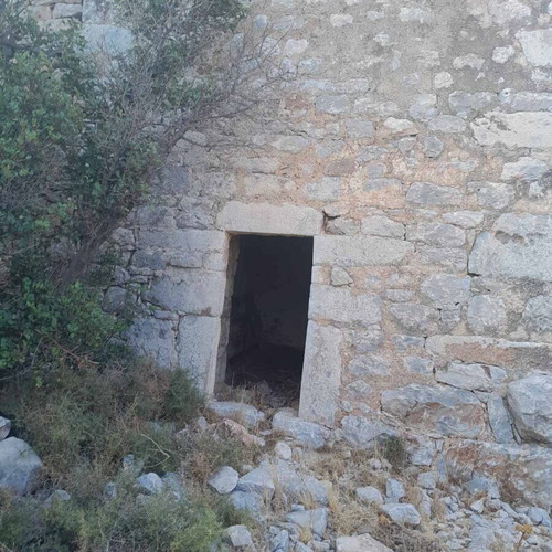 Kapetanospito building from 1876 in Areopoli Mani with sea view