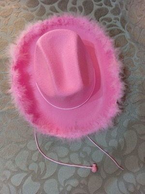 Pink cowboy hat with feathers