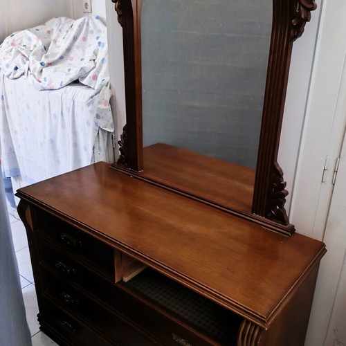 Vintage boudoir with large mirror, carvings, spacious surface and drawers used
