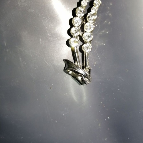 Vintage pin made of brass and rhinestones new
