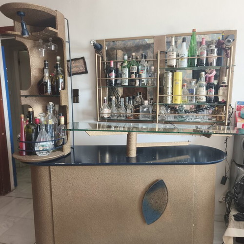 Living room bar used with large storage and glass shelves