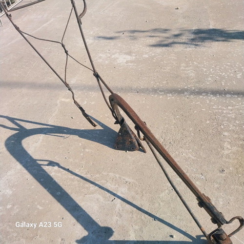 Plow used iron tool from 1940s for soil cultivation