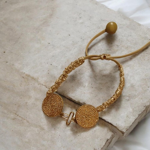 Handmade macrame bracelet with gold elements and ecru cord