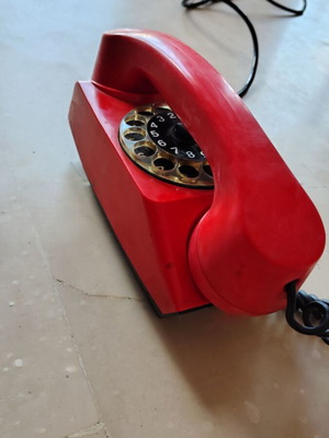 Vintage Safnat Milano rotary telephone used, red bakelite design