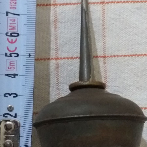 Set of 4 used oil collectors with iron, tin, and plastic