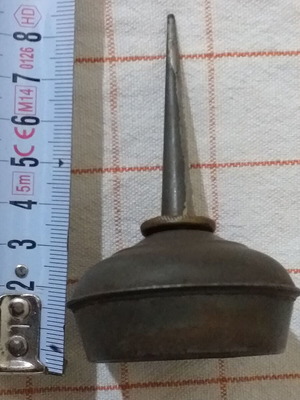 Set of 4 used oil collectors with iron, tin, and plastic