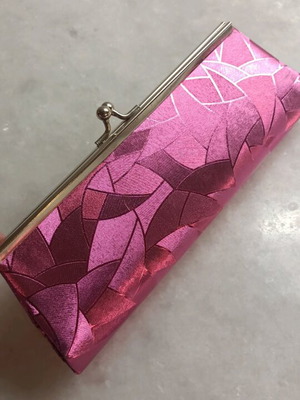 Fux clutch handbag like new, pink glossy with silver clasp