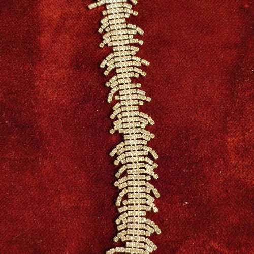 Bracelet with rhinestones like new, wavy design