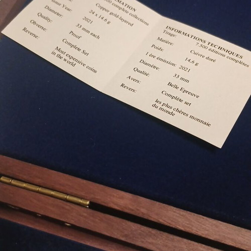 Gold-plated commemorative medals set like new in wooden case with certificates